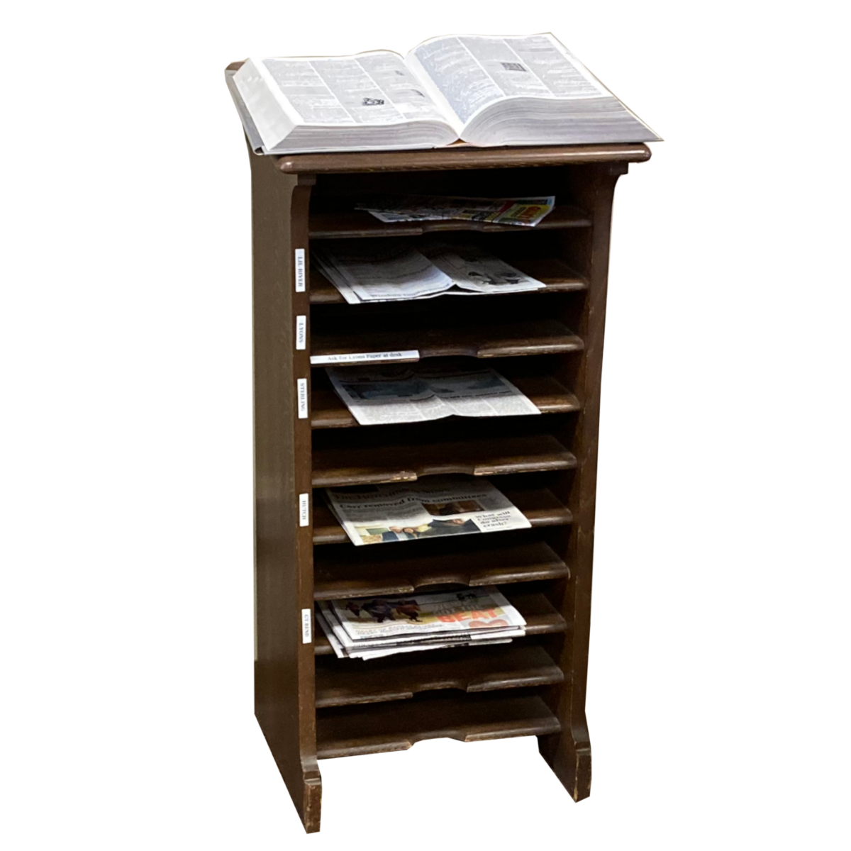 Wood shelves with various newspapers