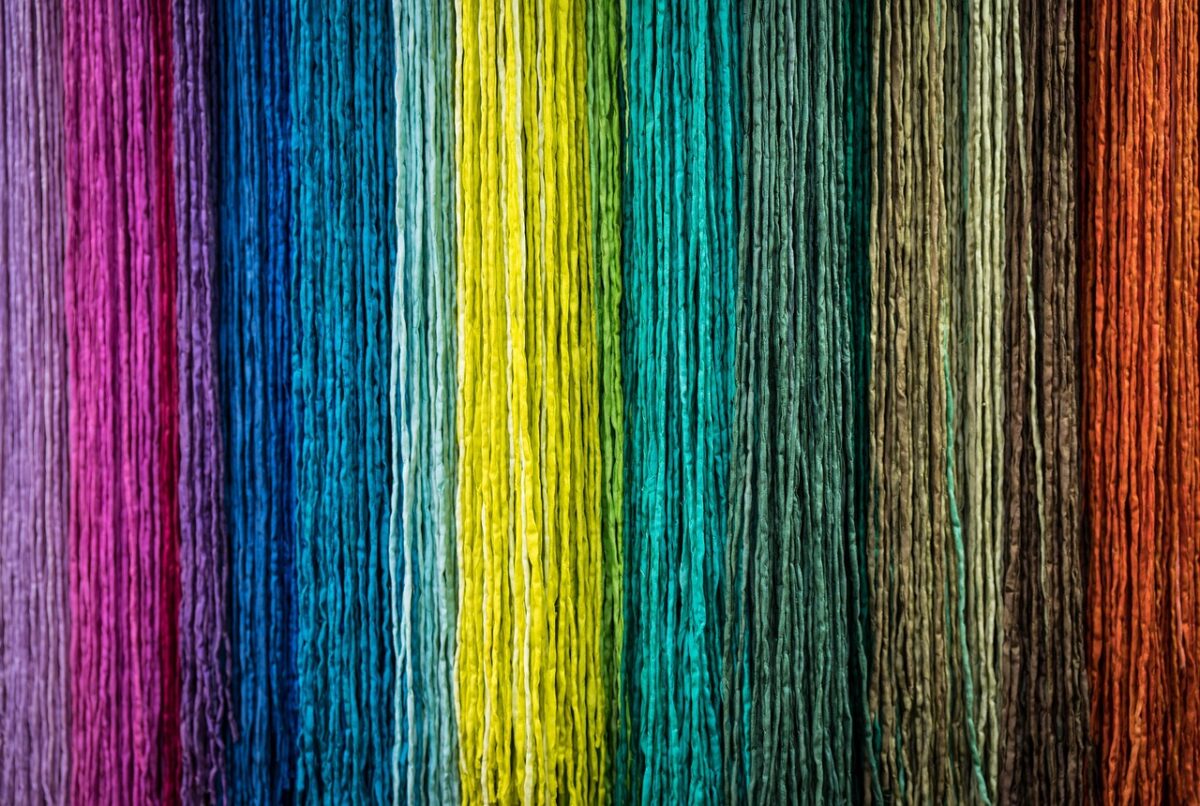 Colored strands of fiber